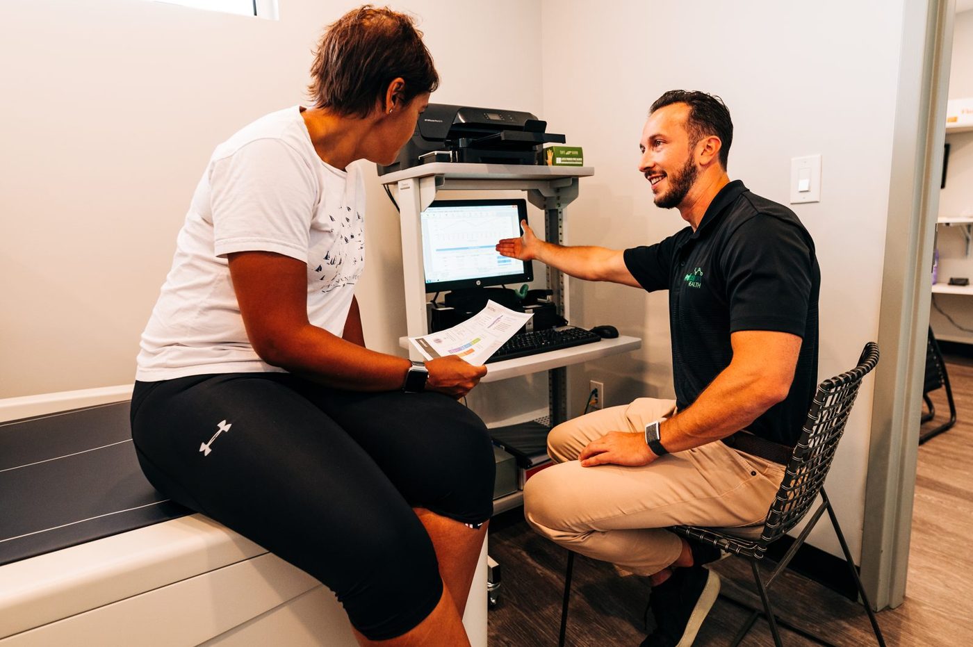 A Prefusion specialist checking in a client before testing
