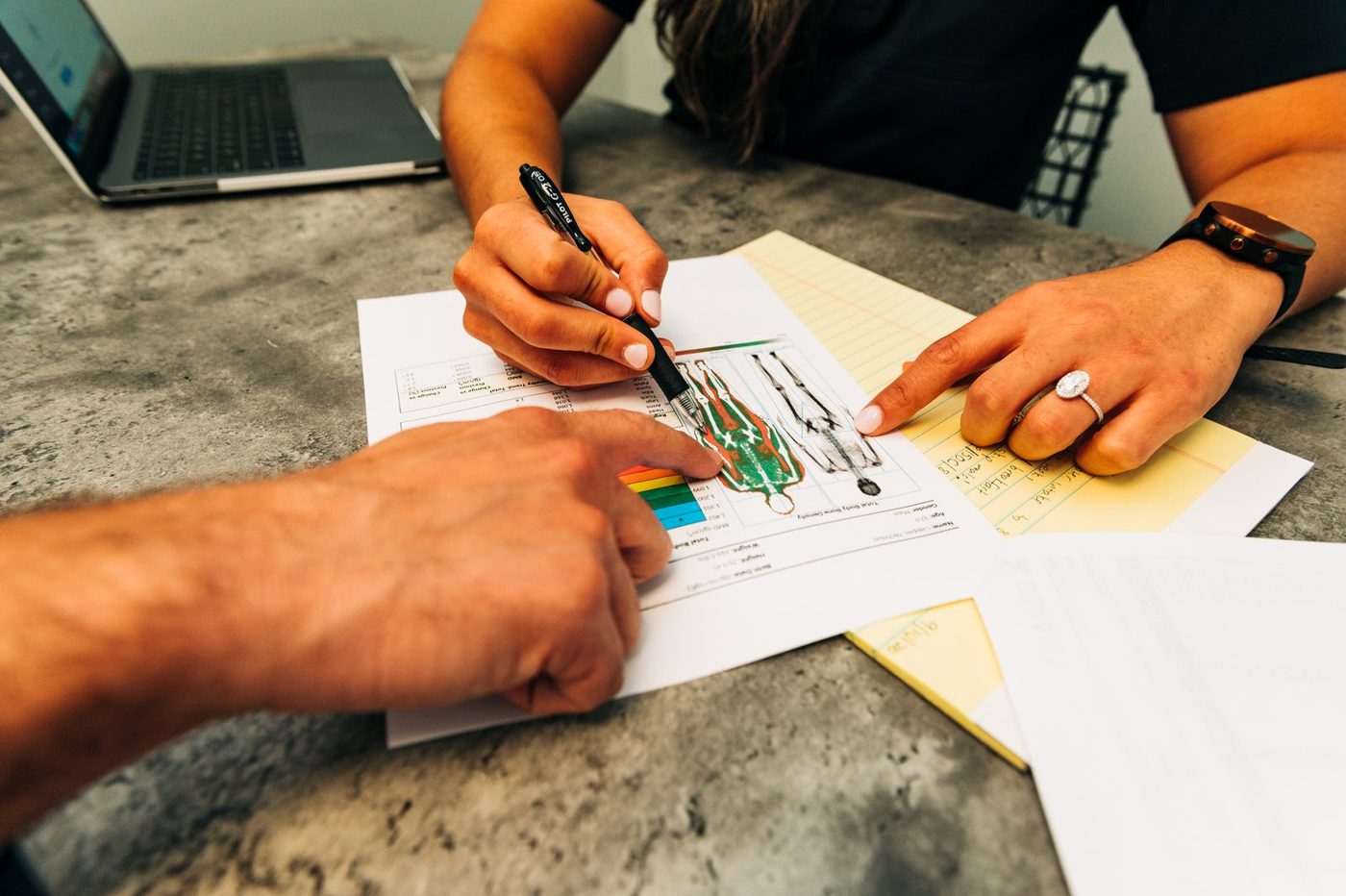 A Prefusion coach writing out a client's plan
